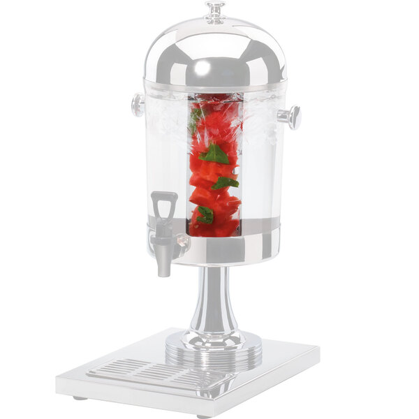 A silver container with a clear container inside with red peppers inside the Cal-Mil infusion chamber.