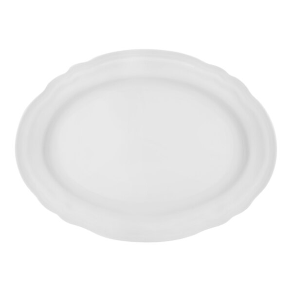 A white porcelain oval platter with a scalloped rim.