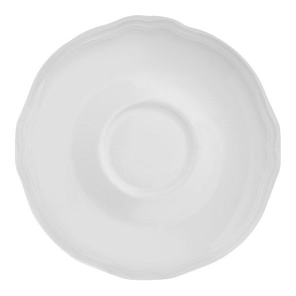 An Arcoroc Athena white porcelain saucer with a scalloped edge.