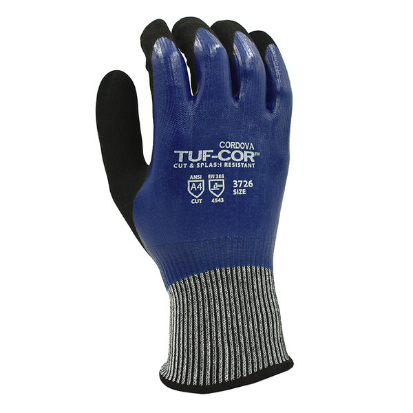 A close-up of a Cordova blue and black Tuf-Cor glove with the word tuffco on it.