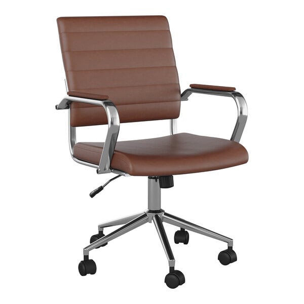 A Martha Stewart brown faux leather swivel office chair with metal arms and wheels.