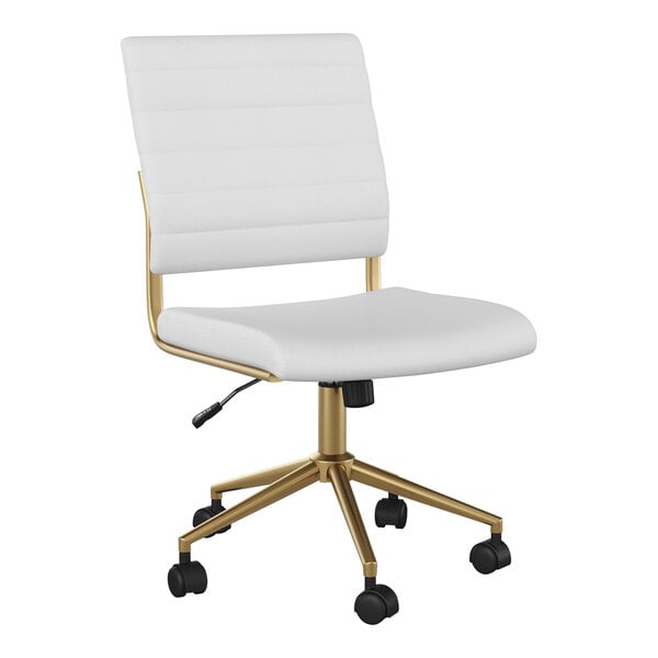 A Martha Stewart white faux leather swivel office chair with gold legs.