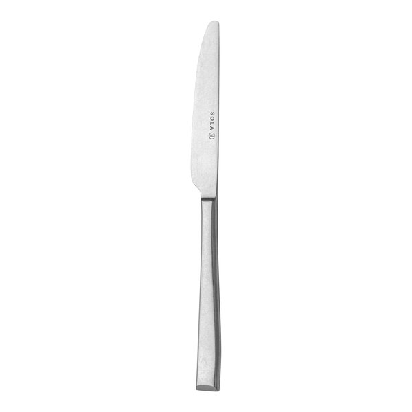 A Sola stainless steel dinner knife with a silver handle.