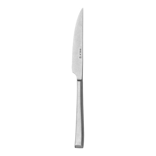 A Sola stainless steel steak knife with a silver handle.
