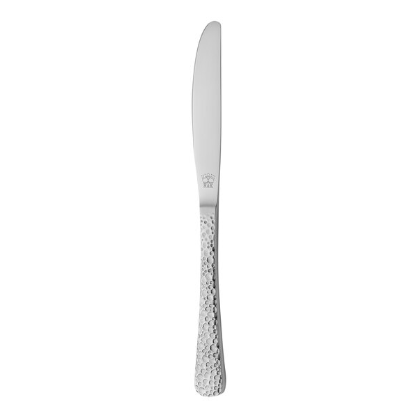 A RAK Youngstown stainless steel butter knife with a textured handle.