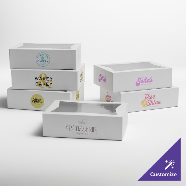A set of white customizable bakery boxes with clear window tops, designed for cakes or pastries.