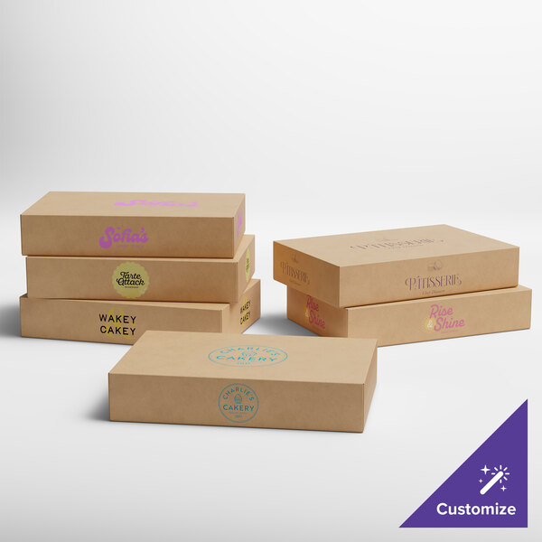 A group of Baker's Lane Kraft donut boxes with different designs, including brown boxes with purple and blue text.
