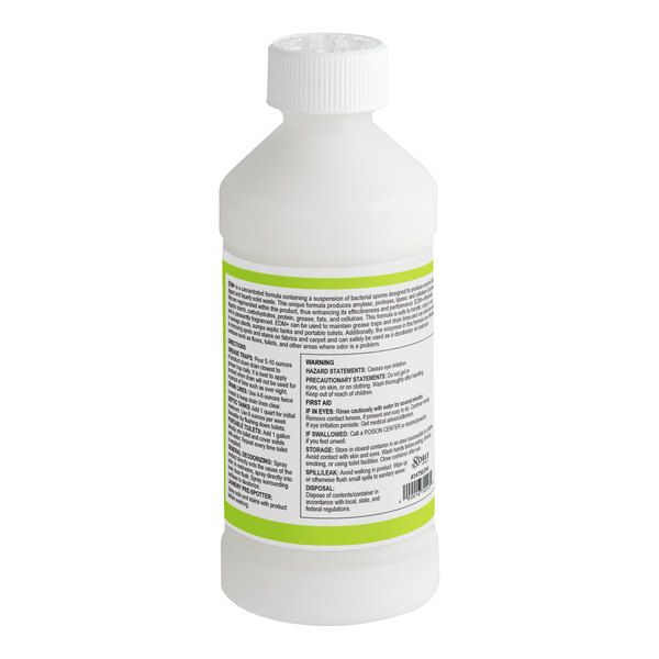 A close-up of a white bottle of Noble Chemical EDM+ Concentrated Enzymatic Drain Maintainer with a green and white label and a white plastic cap.