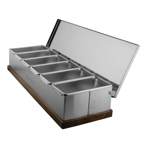 A Pinnacolo stainless steel condiment bar with 6 compartments.