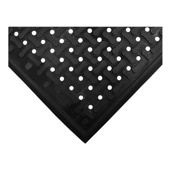 A black rubber M+A Scraper mat with holes.