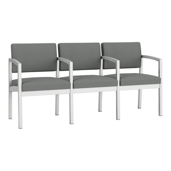 A Lesro Lenox steel sofa with gray fabric and white legs and arms.