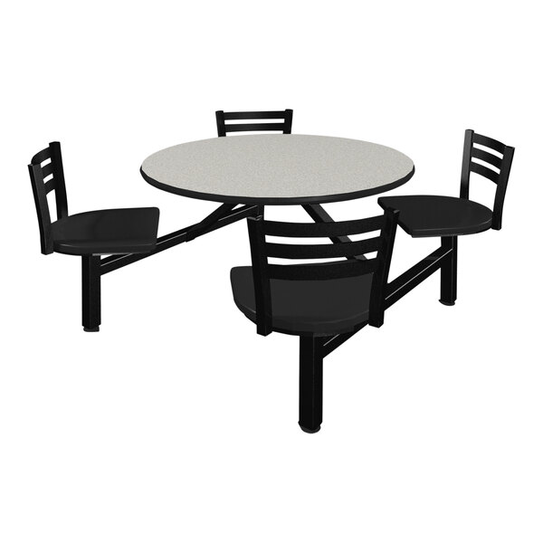 A white Plymold cafeteria table with black chairs around it.