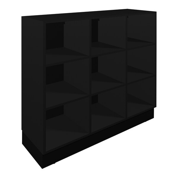 A black Plymold lunch box cubby shelf with square compartments.