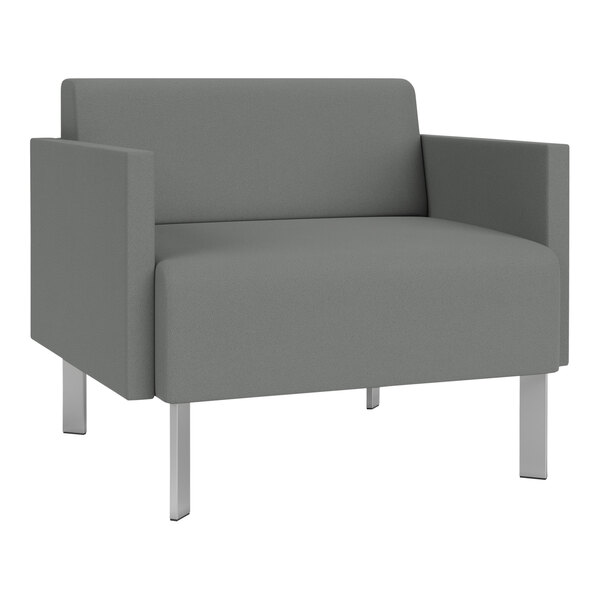 A Lesro Luxe Lounge Series grey fabric bariatric chair with silver legs.