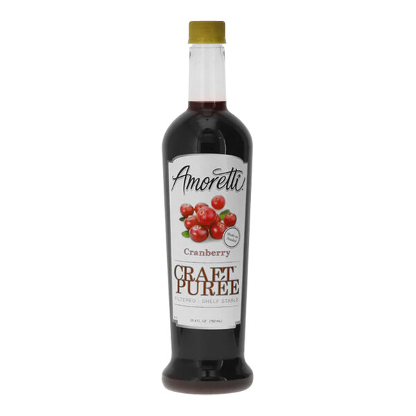 A black bottle of Amoretti Cranberry Craft Puree with a white label featuring red berries.
