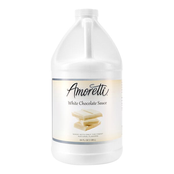 A white jug of Amoretti White Chocolate Sauce with a white label and handle.