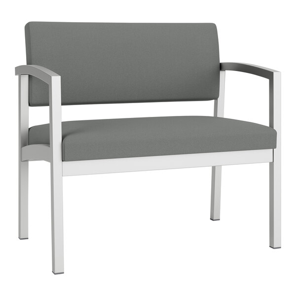 A grey Lesro Lenox bariatric guest chair with white legs.