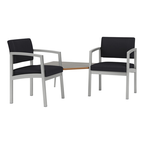 Two black Lesro Lenox chairs with a Sarum Twill laminate table connecting them.