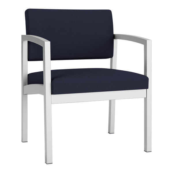 A navy blue Lesro Lenox guest arm chair with white legs.
