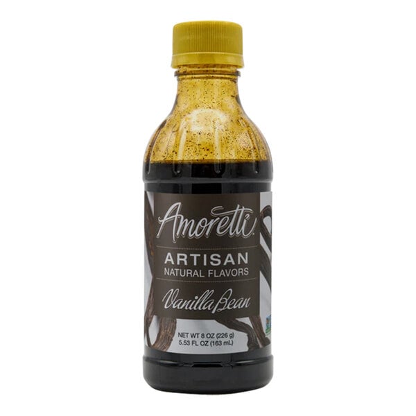 A bottle of Amoretti Vanilla Bean Artisan Natural Flavor Paste with a yellow label and cap.