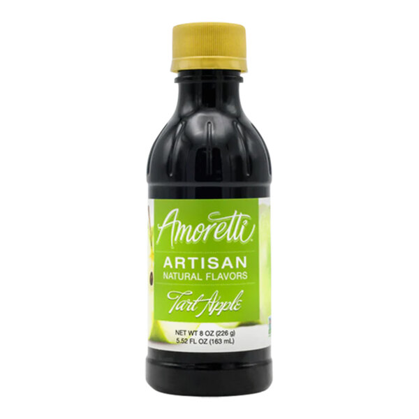 A close up of a bottle of Amoretti Tart Apple Artisan Natural Flavor Paste with a green label and yellow cap.