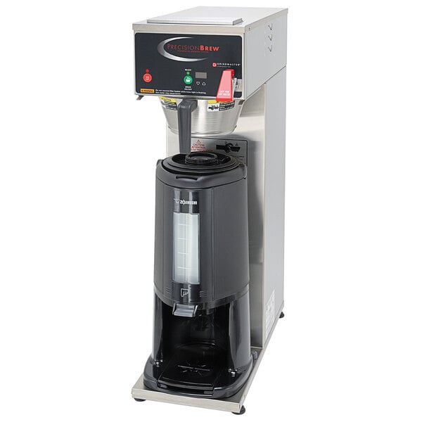A Grindmaster automatic coffee maker with a black container.