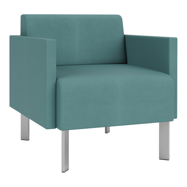 A teal Lesro Luxe Lounge arm chair with chrome legs.