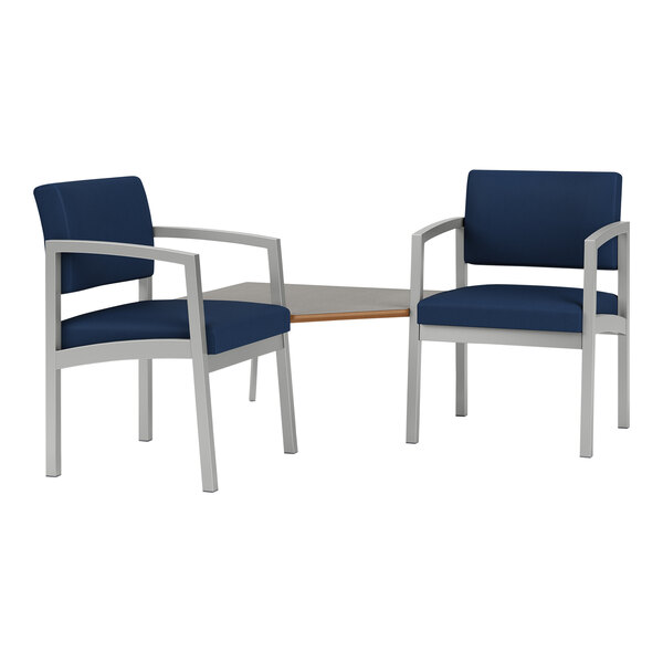 Two Lesro Lenox blue vinyl chairs with Sarum Twill laminate table connecting them.