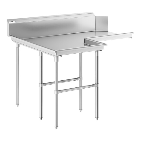 A stainless steel L-shaped table with a backsplash and multiple legs for support.