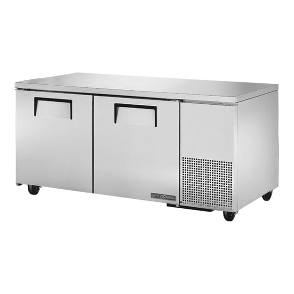 A True stainless steel undercounter refrigerator with two doors.