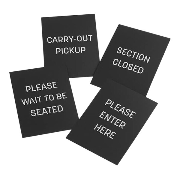 A group of American Metalcraft black signs with white text including the words "carry out" and "closed"