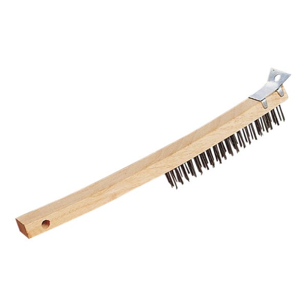 An American Metalcraft wooden brush with metal bristles.
