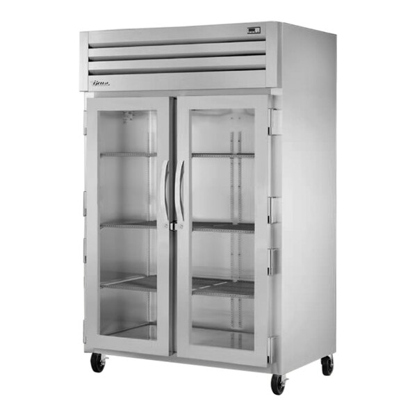A True Spec Series reach-in refrigerator with two glass doors.
