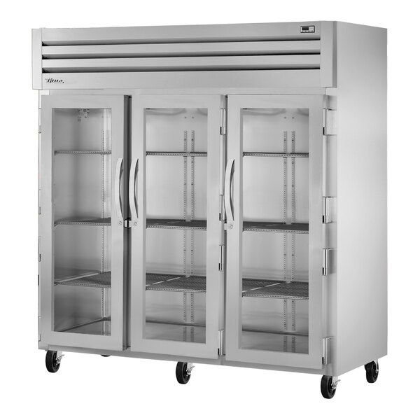 A True Spec Series reach-in refrigerator with three glass doors.
