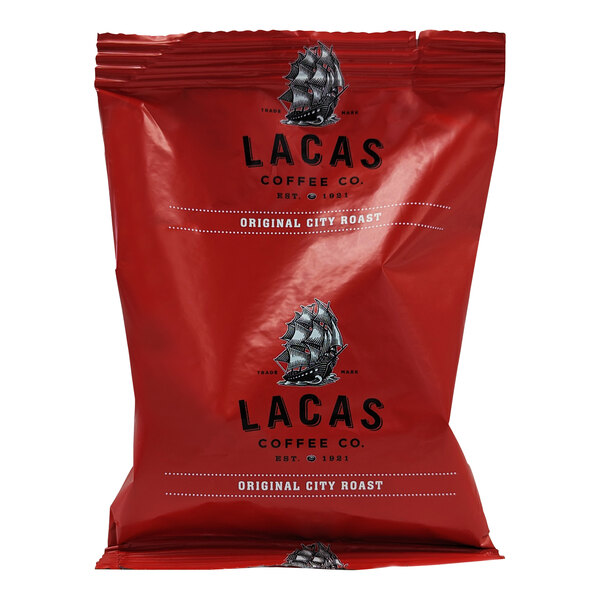 A red Lacas Coffee bag with black text on a white background.