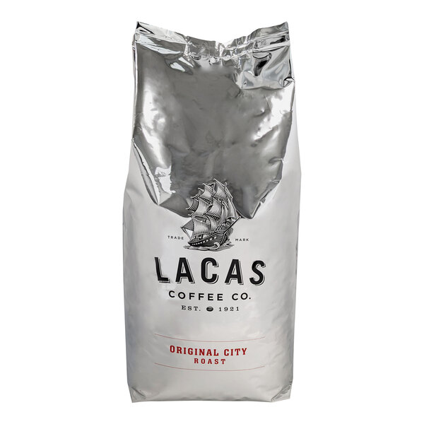 A silver bag of Lacas Coffee whole bean coffee with the Lacas Coffee Co. logo.