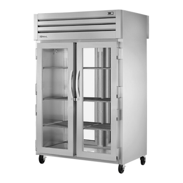 A True Spec Series pass-through refrigerator with glass doors.
