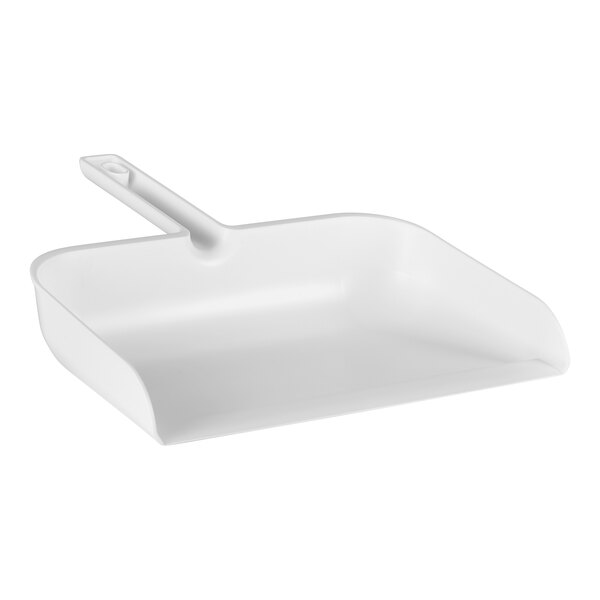 A white Remco dust pan with a handle.