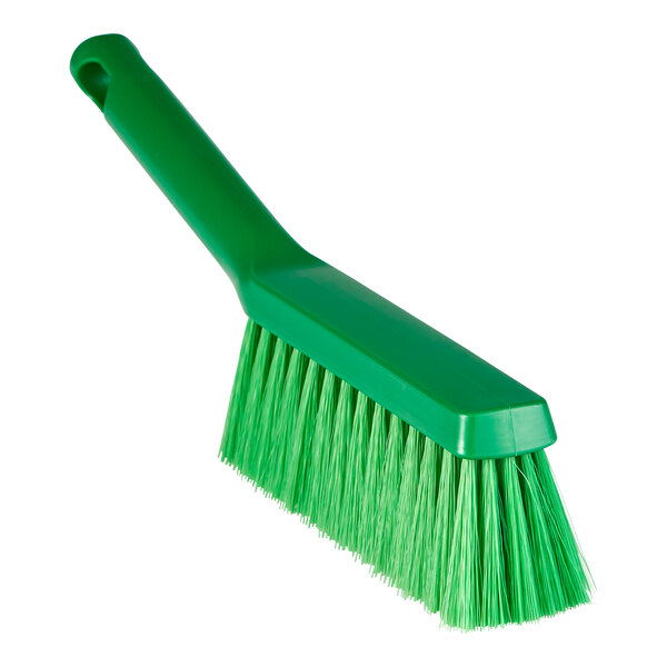 A green Remco ColorCore bench brush with medium bristles.