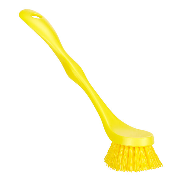 A yellow Remco ColorCore dish brush with a handle.