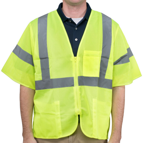 A man wearing a Cordova Cor-Brite lime yellow high visibility safety vest.