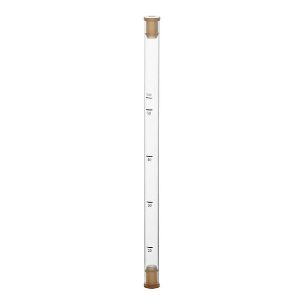 An Avantco sight gauge with a rectangular white cap and black numbers on a glass tube.