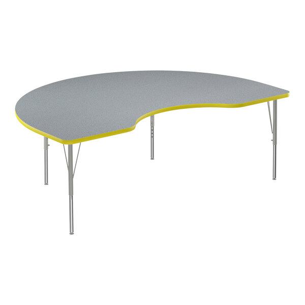 A grey and yellow Correll kidney-shaped activity table.