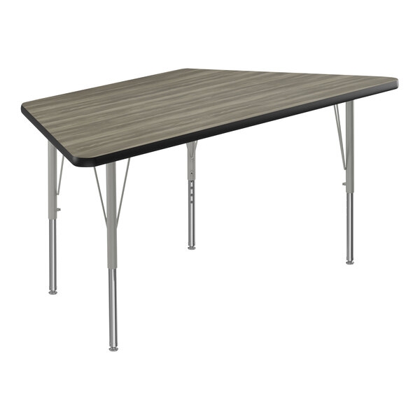 Correll Deluxe 30″ x 60″ Trapezoid New England Driftwood 19″-29″ Adjustable Height High-Pressure Laminate Top Activity Table with Silver Legs and Black T-Mold