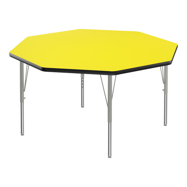 A yellow hexagon Correll activity table with silver legs and black edges.