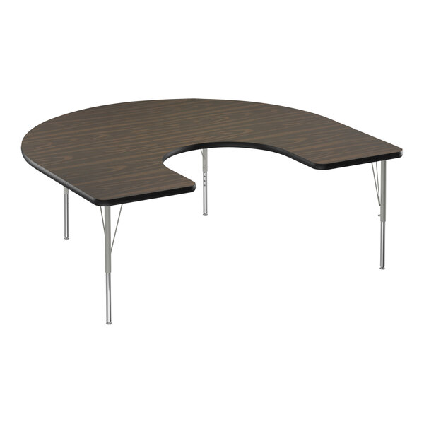 A Correll walnut horseshoe-shaped activity table with silver legs.