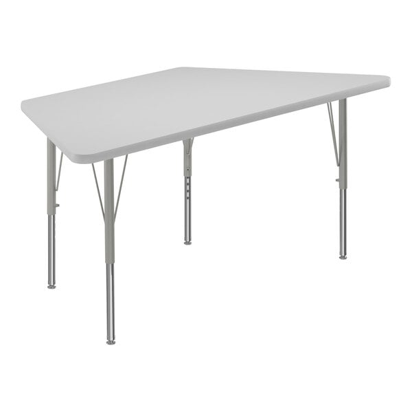 Correll 26″ x 58″ Trapezoid White 19″-29″ Adjustable Height High-Pressure Dry Erase Board Top Activity Table with Silver Legs and Gray T-Mold
