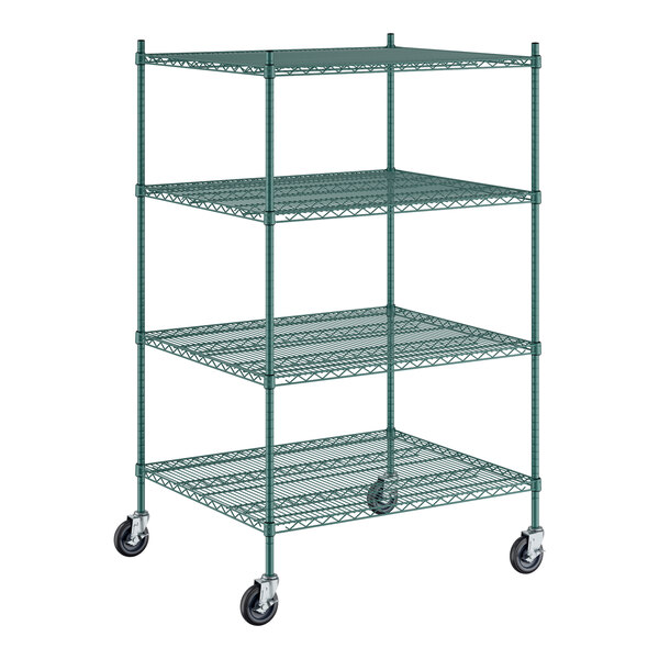 A green Regency mobile wire shelving unit with wheels.