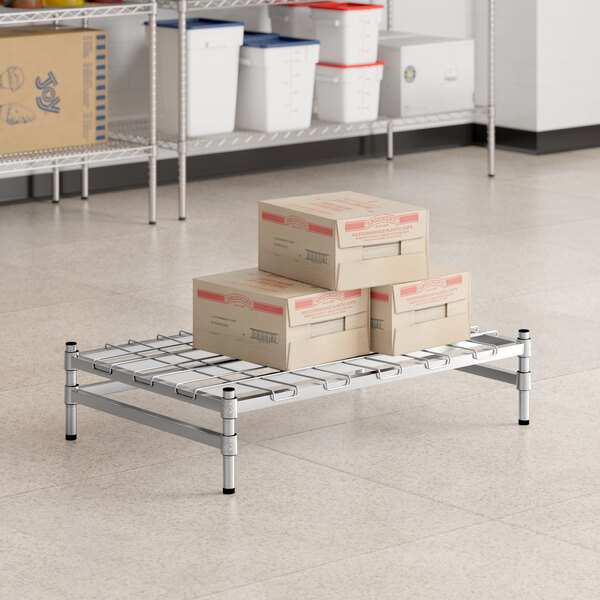 Regency Spec Line 24" x 36" x 8" NSF Stainless Steel Wire Stationary Dunnage Rack with Wire Mat and 3-Sided Frame