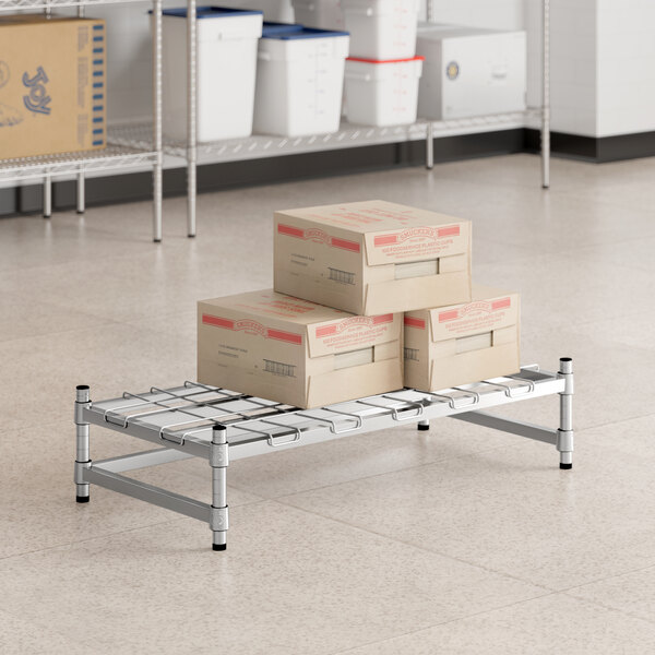 Regency Spec Line 18" x 36" x 8" NSF Stainless Steel Wire Stationary Dunnage Rack with Wire Mat and 3-Sided Frame